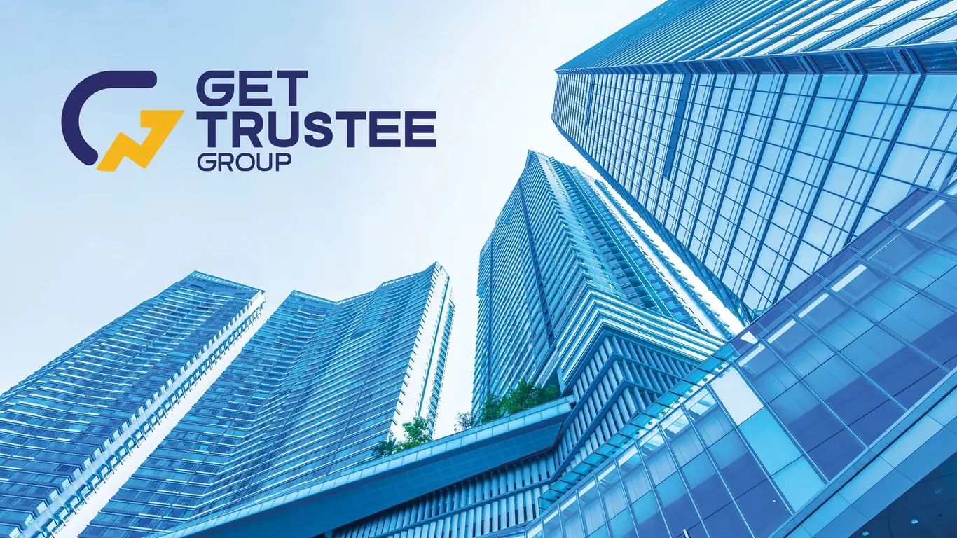GET Trustee Group logo in navy and yellow set over blue glass office towers