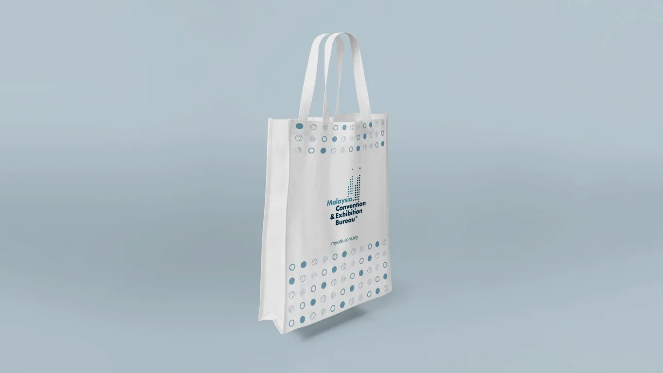 MyCEB fabric tote bag carrying the circle pattern, logo and website address