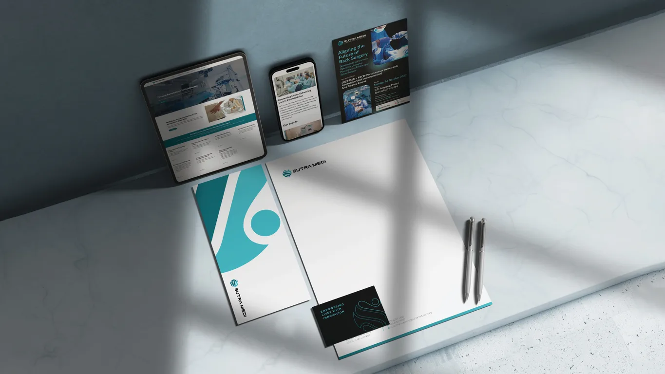 Sutra Medi-Environ letterhead, folder and business card beside the new website on tablet and phone